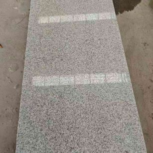 吴忠芝麻白光面毛板